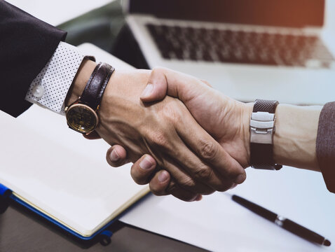 Close up of Business partnership making handshake and meeting concept in the office