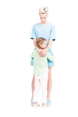 Vertical full length isolated shot of cute little girl with two braids hugging her loving mother, white background