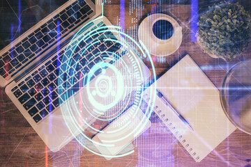 Multi exposure of data theme drawing hologram over topview work desk background with computer. Concept of technology.