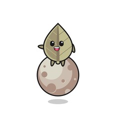 illustration of dried leaf cartoon sitting on the moon