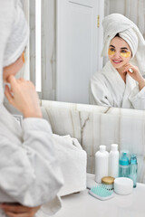 beautiful woman with eye patches in white bathrobes in bathroom