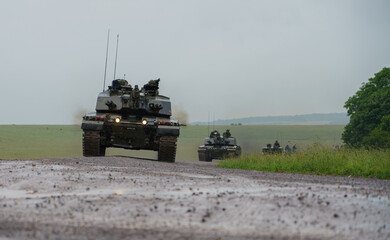 a convoy of British army FV4034 Challenger 2 II main battle tanks on exercise, Wiltshire UK