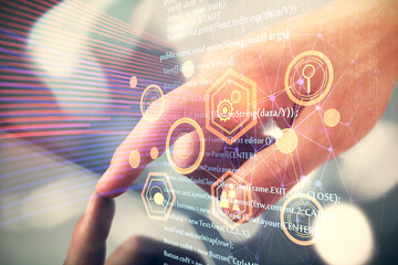 Multi exposure of man's hand holding and using a digital device and data theme drawing. Innovation concept.
