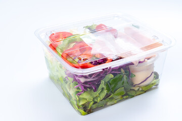 Vegetable salad in clear plastic box Ready-to-eat breakfast that is available for sale at the...