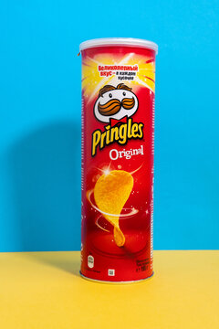 Tyumen, Russia-June 21, 2021: Pringles chips original. Pringles is a brand of potato chips. Vertical photo