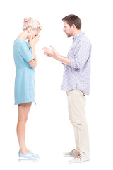 Vertical full length side view studio shot of man comforting his sad wife crying about something, white background