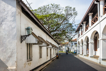 Fototapeta na wymiar Hospital street at sunny day. Ancient Dutch Galle Fort (UNESCO World Heritage Site), Sri Lanka.