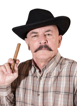 The cowboy with mustache, in a black hat smoking a cigar