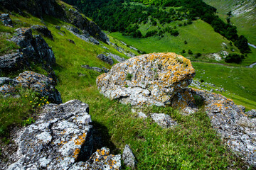 Beautiful green landscapes with hills, forest and rocks in Moldova. Eco tourism without people.