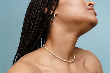 Portrait of a smiling young african woman with dreadlocks