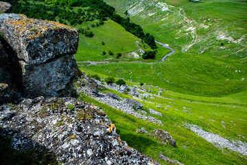 Beautiful green landscapes with hills, forest and rocks in Moldova. Eco tourism without people.