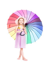 Vertical full length studio portrait of cute Caucasian girl wearing summer dress and hat holding colorful umbrella posing on camera, white background