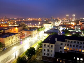 Obraz premium Blurred colorful lights of the night city