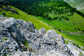 Beautiful green landscapes with hills, forest and rocks in Moldova. Eco tourism without people.