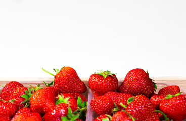 Strawberry raw background, a lot of Fresh red berries in contaniers, Close up the half of strawberries, Top view, High resolution product. Healthy organic fresh product. Copy space.