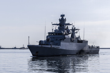 WARSHIP - A German Navy corvette is maneuvering in a port 