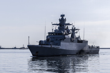 Obraz premium WARSHIP - A German Navy corvette is maneuvering in a port 
