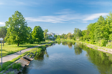 Summer view on Gwda river in city center of Pila, Poland.