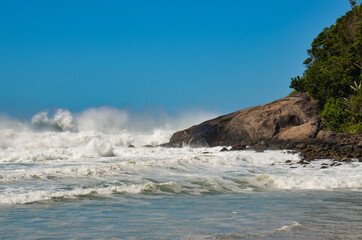 waves crashing on rocks