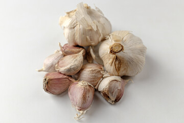 raw garlic on a white background