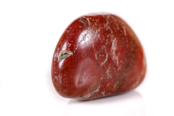 Macro mineral stone jasper on a white background