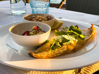 grilled turbot fillet with side dishes, Port Andratx, Mallorca, Spain