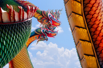 Udon Thani, Thailand - 21 June 2021 : Twin Stucco painted as a large serpent at Pra kai keaw wang...