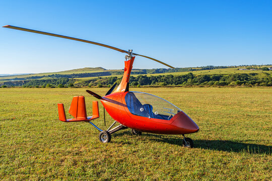 Autogyro Kalidus is parked after a flight at a mountain airfield.
