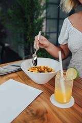 person eating breakfast in the kitchen