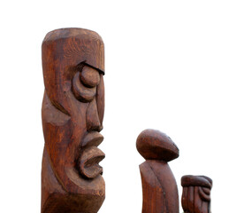 wooden idol statue of koryak on a white background