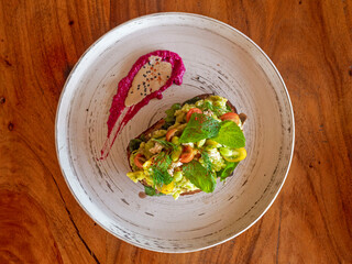 Avocado salad on soft crispy bread