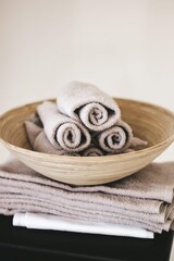 Obraz na płótnie Canvas small kitchen towels rolled up bath towels