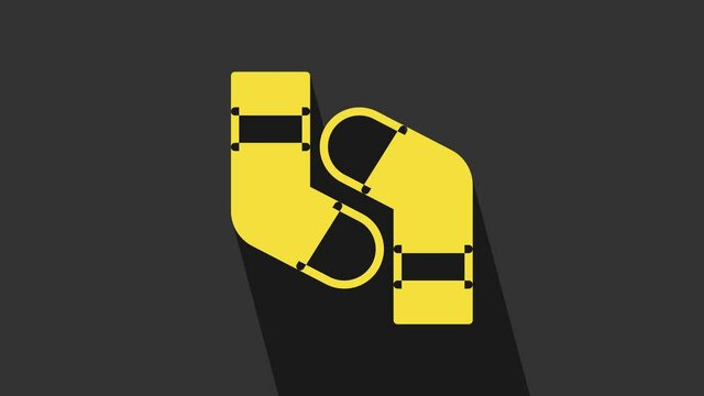 Yellow Socks icon isolated on grey background. 4K Video motion graphic animation