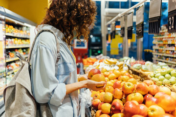 Young woman wearing casual outfit with backpack
