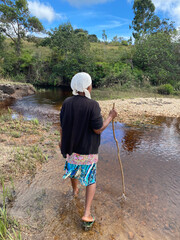 child on the river