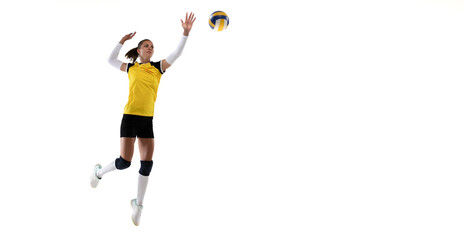 Fototapeta na wymiar Female professional volleyball player with ball isolated on white studio background. The athlete, exercise, action, sport, healthy lifestyle, training, fitness concept.