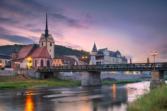 Gera, Germany. Cityscape image of old town Gera, Thuringia, Germany with St. Mary's Church and Untermhaus Bridge over White Elster River at sunset.