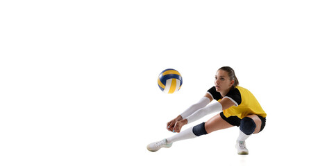 Female professional volleyball player with ball isolated on white studio background. The athlete, exercise, action, sport, healthy lifestyle, training, fitness concept. © master1305
