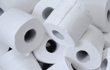 Pile of toilet paper tissue rolls.