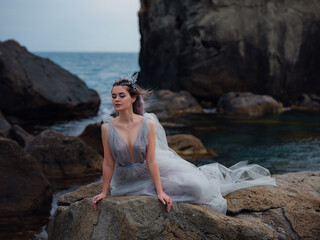 a beautiful woman like a fairy or nymph walking in the park