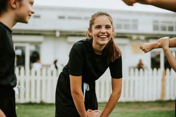 Girls stretching on the field