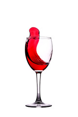 Moving red wine glass isolated on white background