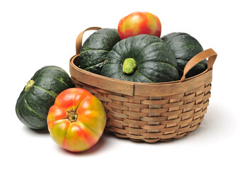 Green mini pumpkin and tomato isolated on the white background .