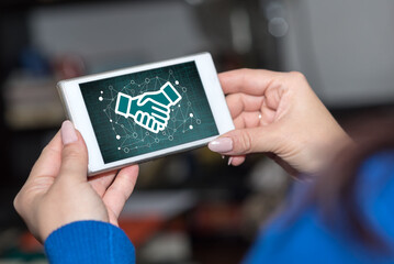 Business partnership concept on a smartphone