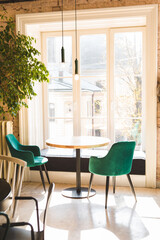 empty table in cafe near window