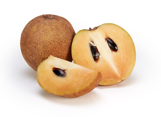 Whole and slice of sapodilla fruit isolated on white background