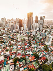 Makati, Metro Manila, Philippines - Dramatic late afternoon aerial of relatively low density...