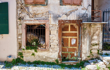 Exterior of a ruined abandoned traditional house