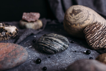 Place for your product on stone on a witch's table in a dark atmosphere. Mockup.