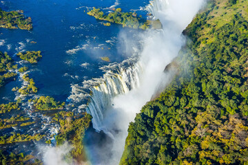 Bird eye view of the Victoria falls waterfall on Zambezi river - obrazy, fototapety, plakaty